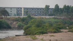 Scam compound buildings in Myanmar can be seen in this picture taken from Mae Sot, Thailand in February 2025.
