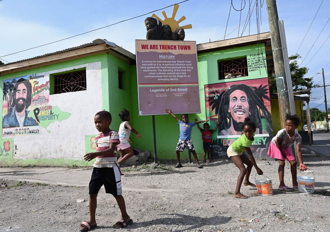 Children play in the Trench Town neighborhood of Kingston, Jamaica on May 18, 2019. In the 1960s, Trench Town was known as the Hollywood of Jamaica and is the birthplace of reggae music, as well as the home of Bob Marley.