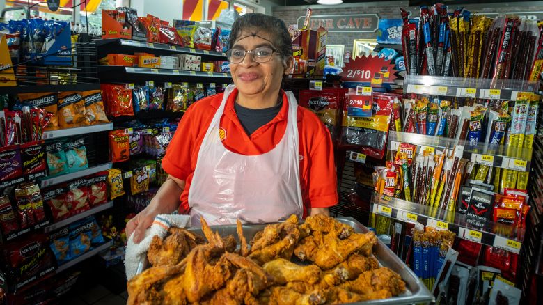 Marta Miranda cooks fried chicken at the Quik Shoppe located at a Shell station on the corner of South and East Blvd. in Charlotte, NC. (The business is now called Market Express, but locals continue to call it Quik Shoppe.) Originally from El Salvador, Miranda has been frying chicken for this company for 18 years.