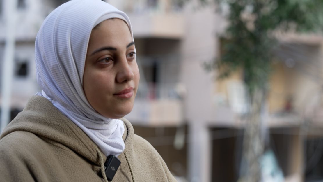 Marwa, 25, speaks to CNN from her badly damaged home in the southern suburbs of Beirut following two months of displacement.