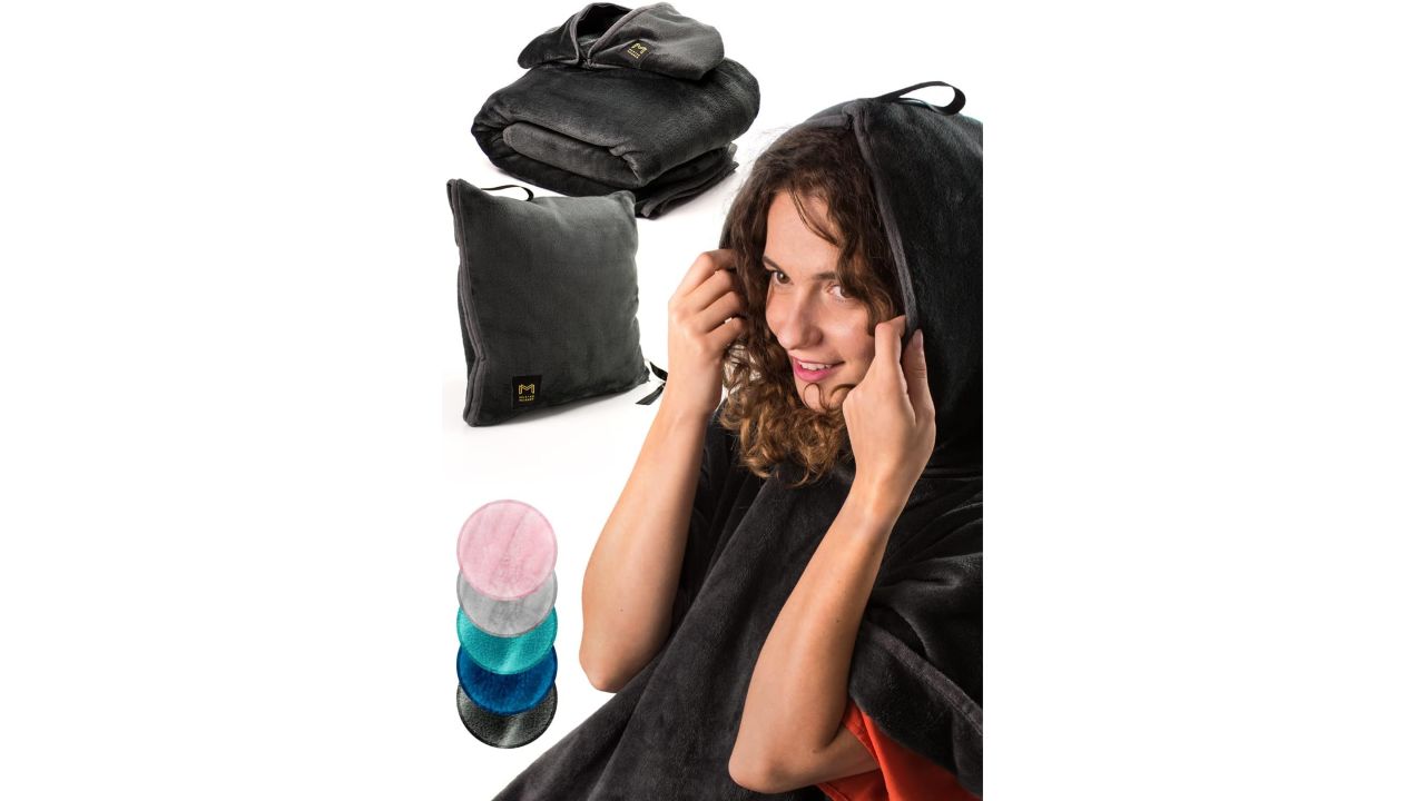 Woman wearing mastermanner travel blanket hoodie