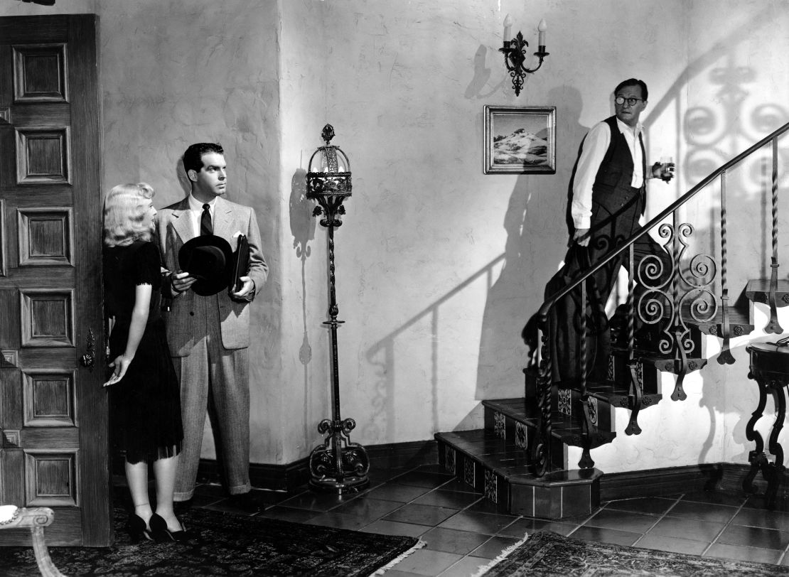 Barbara Stanwyck, Fred MacMurray and Tom Powers are pictured in Billy Wilder's "Double Indemnity."