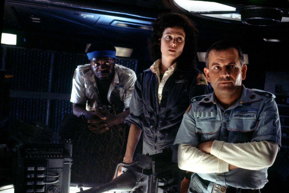 MCDALIE FE037<br />(from left) Yaphet Kotto, Sigourney Weaver and Ian Holm in 