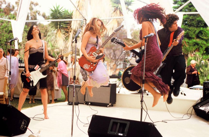 In the closing scene of the first film, Lohan wore a lilac, lace-trimmed two piece from '90s brand Mandalay.