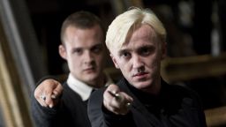 HARRY POTTER AND THE DEATHLY HALLOWS: PART 2, from left, Josh Herdman, Tom Felton, 2011. ©2011 Warner Bros. Ent. Harry Potter publishing rights ©J.K.R. Harry Potter characters, names and related indicia are trademarks of and ©Warner Bros. Ent. All rights reserved./Courtesy Everett Collection