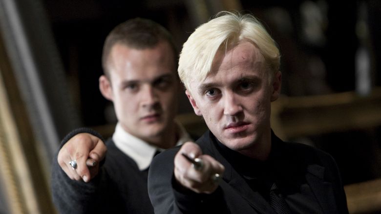 HARRY POTTER AND THE DEATHLY HALLOWS: PART 2, from left, Josh Herdman, Tom Felton, 2011. ©2011 Warner Bros. Ent. Harry Potter publishing rights ©J.K.R. Harry Potter characters, names and related indicia are trademarks of and ©Warner Bros. Ent. All rights reserved./Courtesy Everett Collection