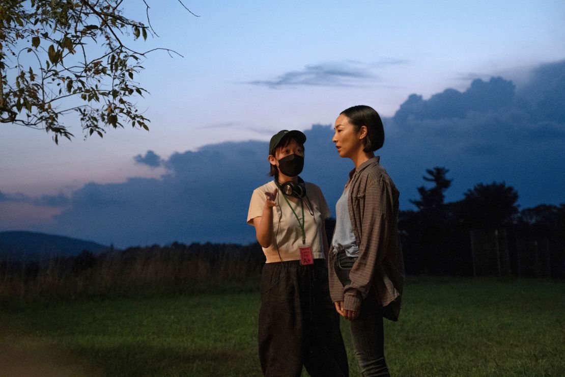 Director Celine Song talks to lead actress Greta Lee on the set of "Past Lives."