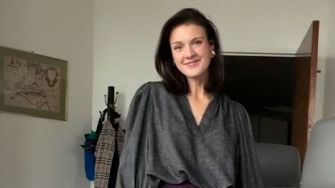 This still from video originally posted to Instagram shows Office of Personnel Management spokesperson McLaurine Pinover as she films fashion content in her office.