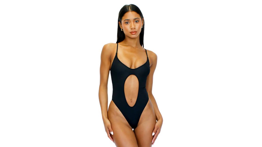 Woman wearing black Merlo one-piece swimsuit