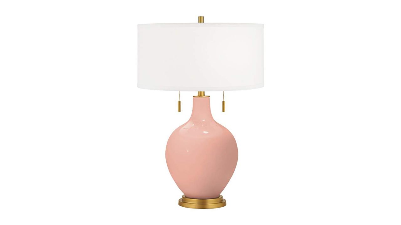 mellow-coral-toby-brass-accents-table-lamp__95t21 peach fuzz cnnu.jpg