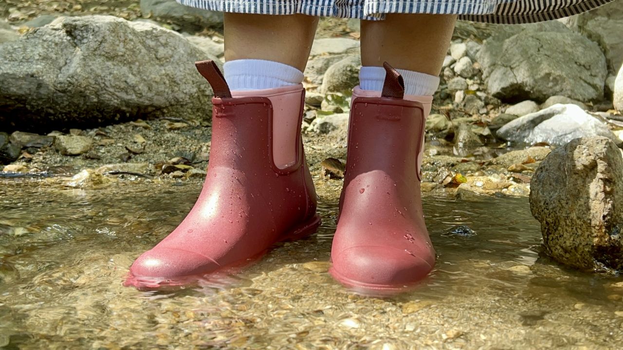 merry people bobbi ankle rain boots being testing in a creek