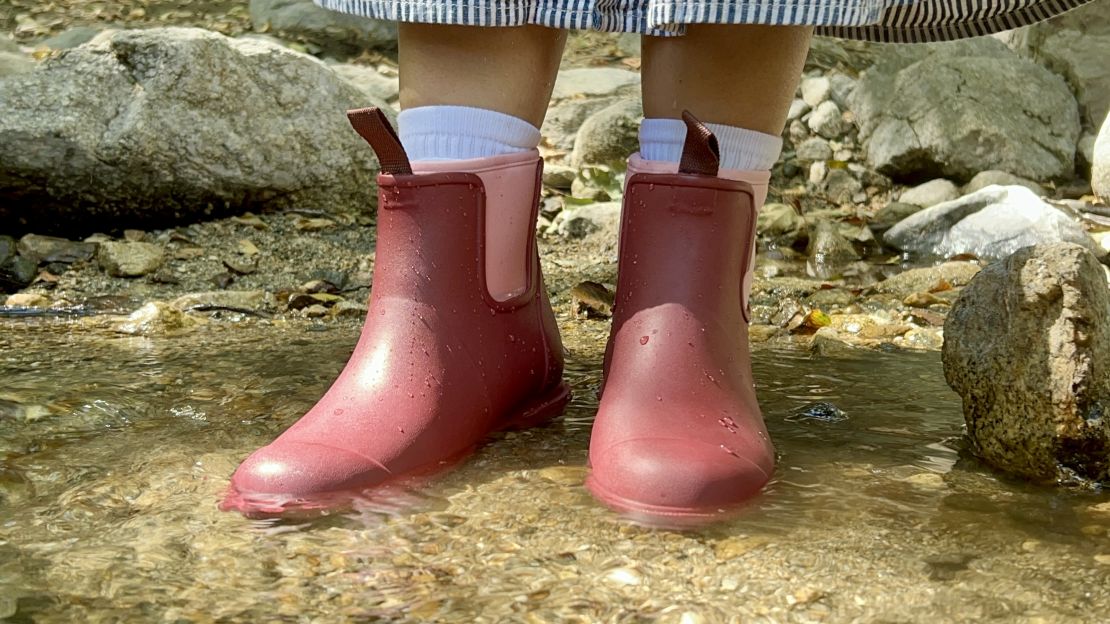 merry people bobbi ankle rain boots being testing in a creek