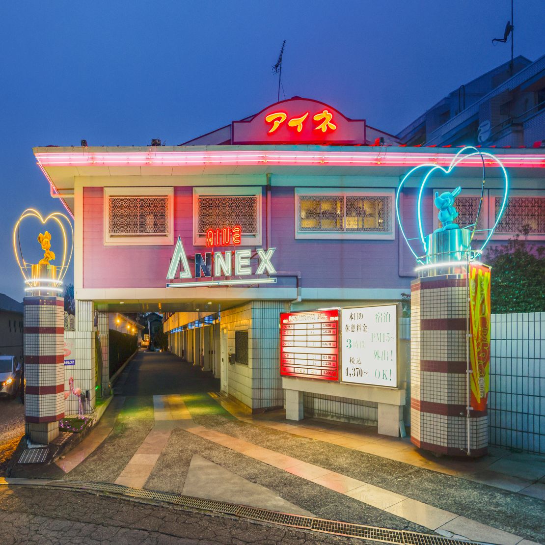 A neon-lit love hotel in the city of Numazu.