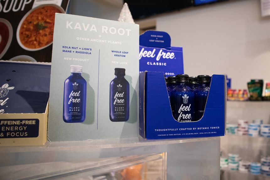 Feel Free Classic is displayed near signs advertising soup in a gourmet grocery store in Atlanta.