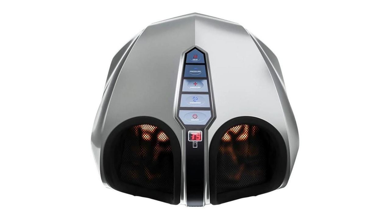 Grey foot massager with foot openings visible, placed against white background.
