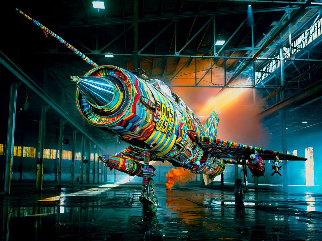 A decommissioned Soviet MiG-21 fighter jet was turned into an intricate work of art by South African artist Ralph Ziman. The giant installation piece is the final entry in Ziman’s series “Weapons of Mass Production,” which transforms artifacts of war using millions of traditional beads.