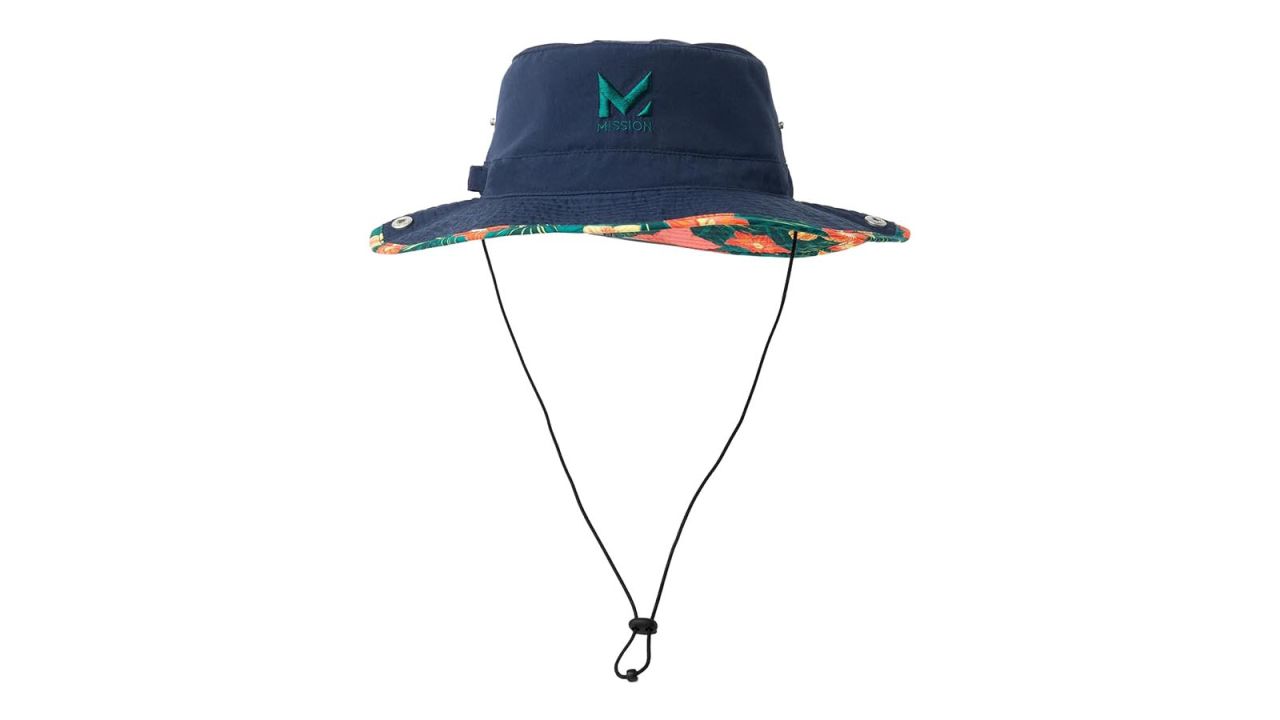 Bucket hat with string hanging down against white background.