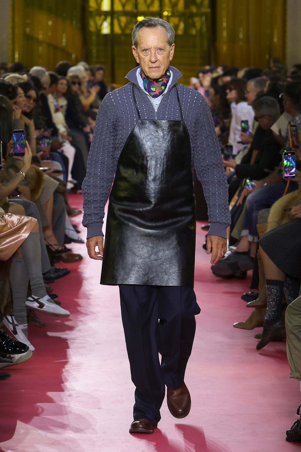 Actor Richard E. Grant walking the Miu Miu Spring-Summer 2026 catwalk.