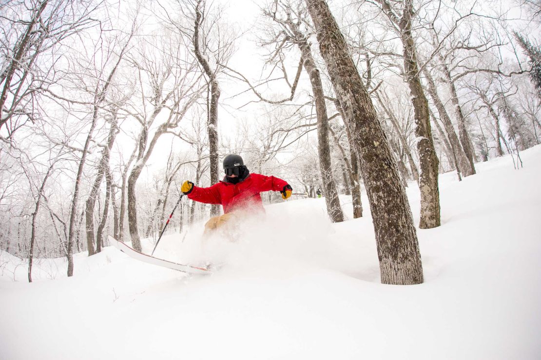 A photo of a person skiing in the Okemo Mountain Resort