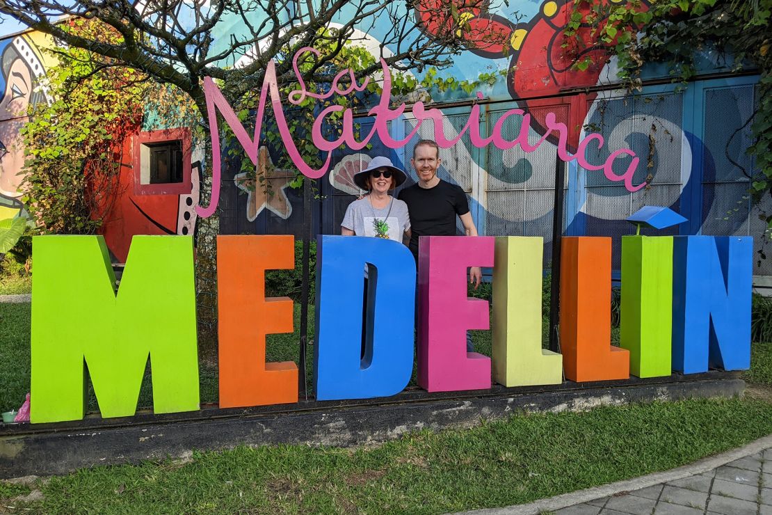 Bennett poses with his mom during one of his family's visits to Medellín.