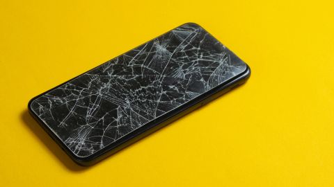 A smartphone with a broken screen.