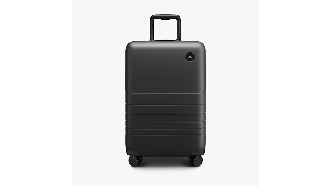 A photo of the Monos Carry-On Plus luggage in black