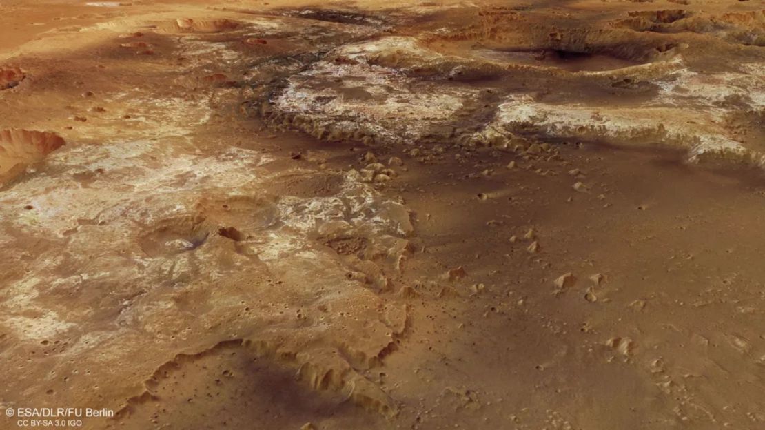 Los depósitos claros y oscuros en Mawrth Vallis indican minerales arcillosos que se formaron en presencia de agua.