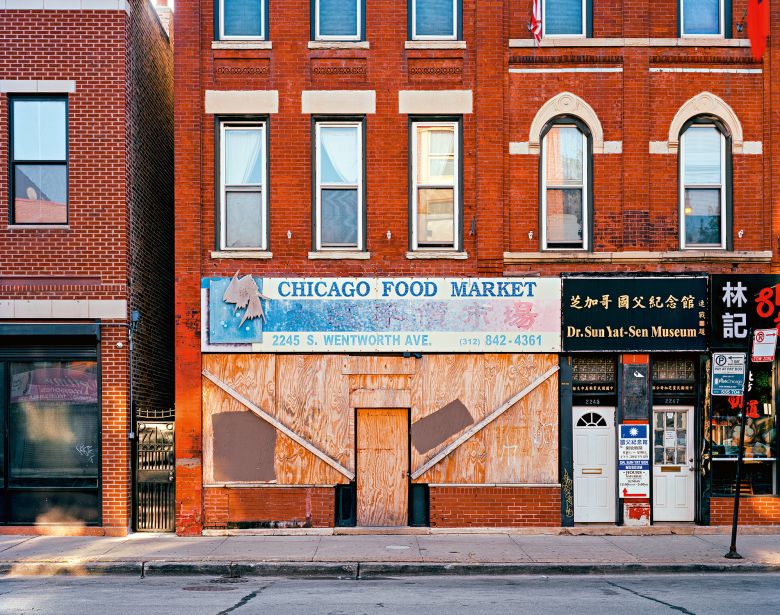 A seafood market boarded up in Chicago's Chinatown — though the store is, today, open for business.