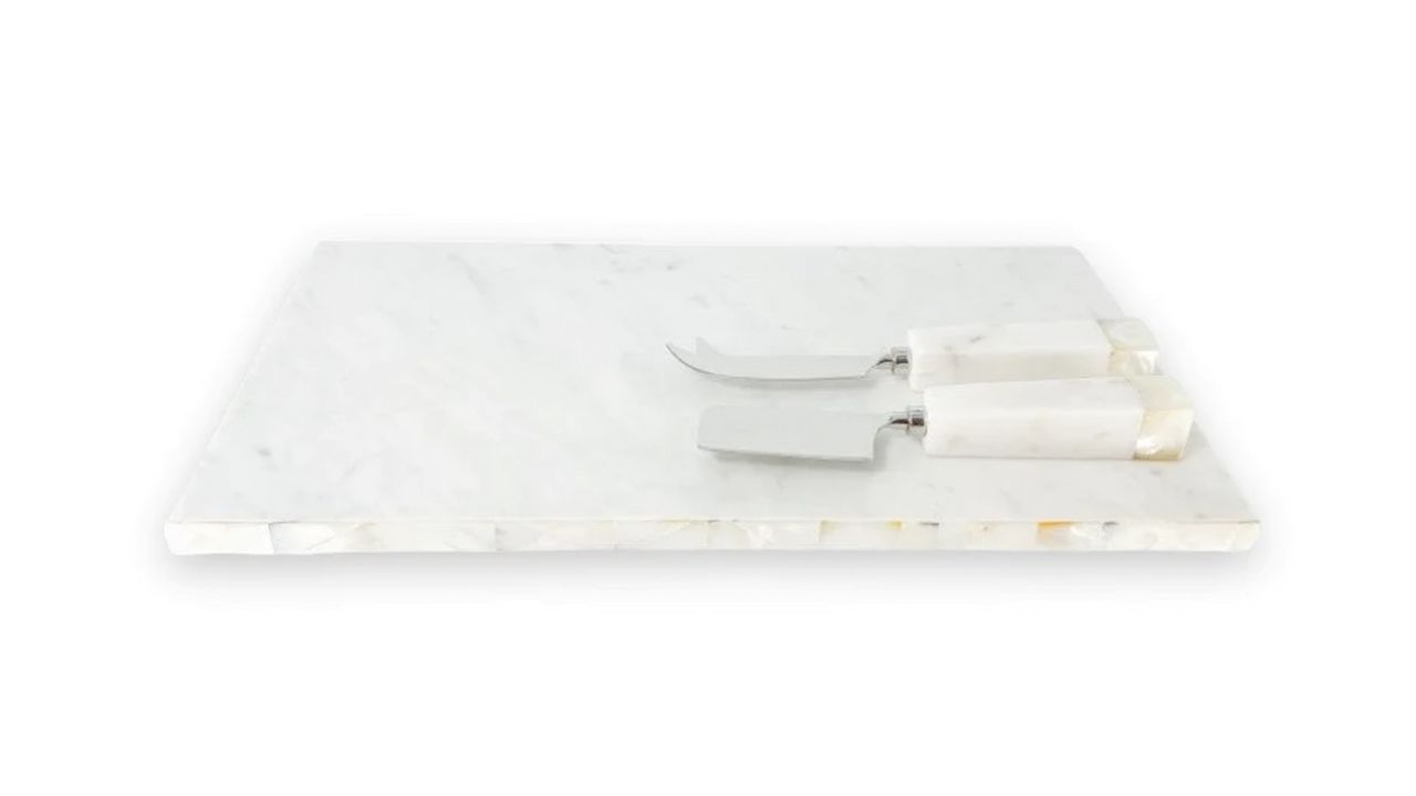 mother-of-pearl and marble cheese board with utensils