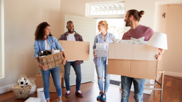 Happy couple moving into a new home