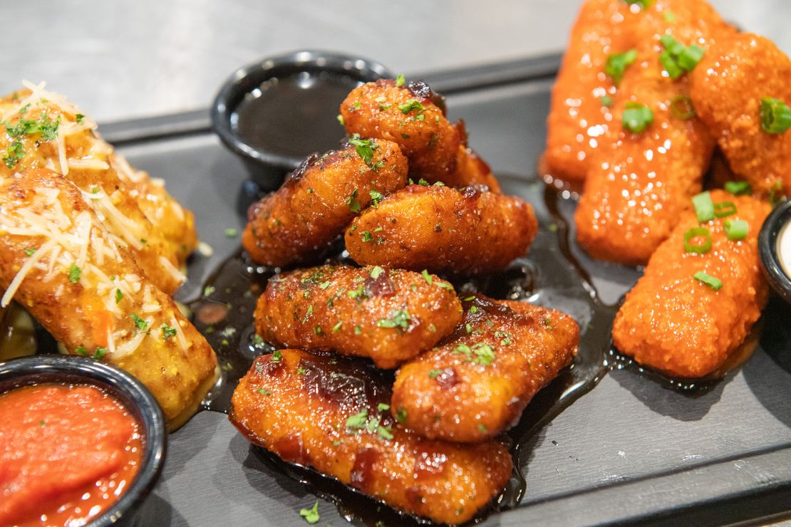 The chain's revamped mozzarella sticks can be coated in a sauce.
