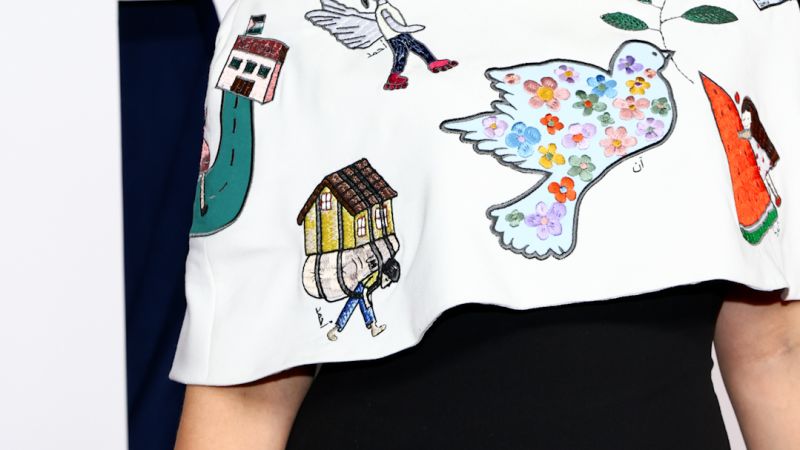 Ms. Rachel wears dress with children’s artwork from Gaza