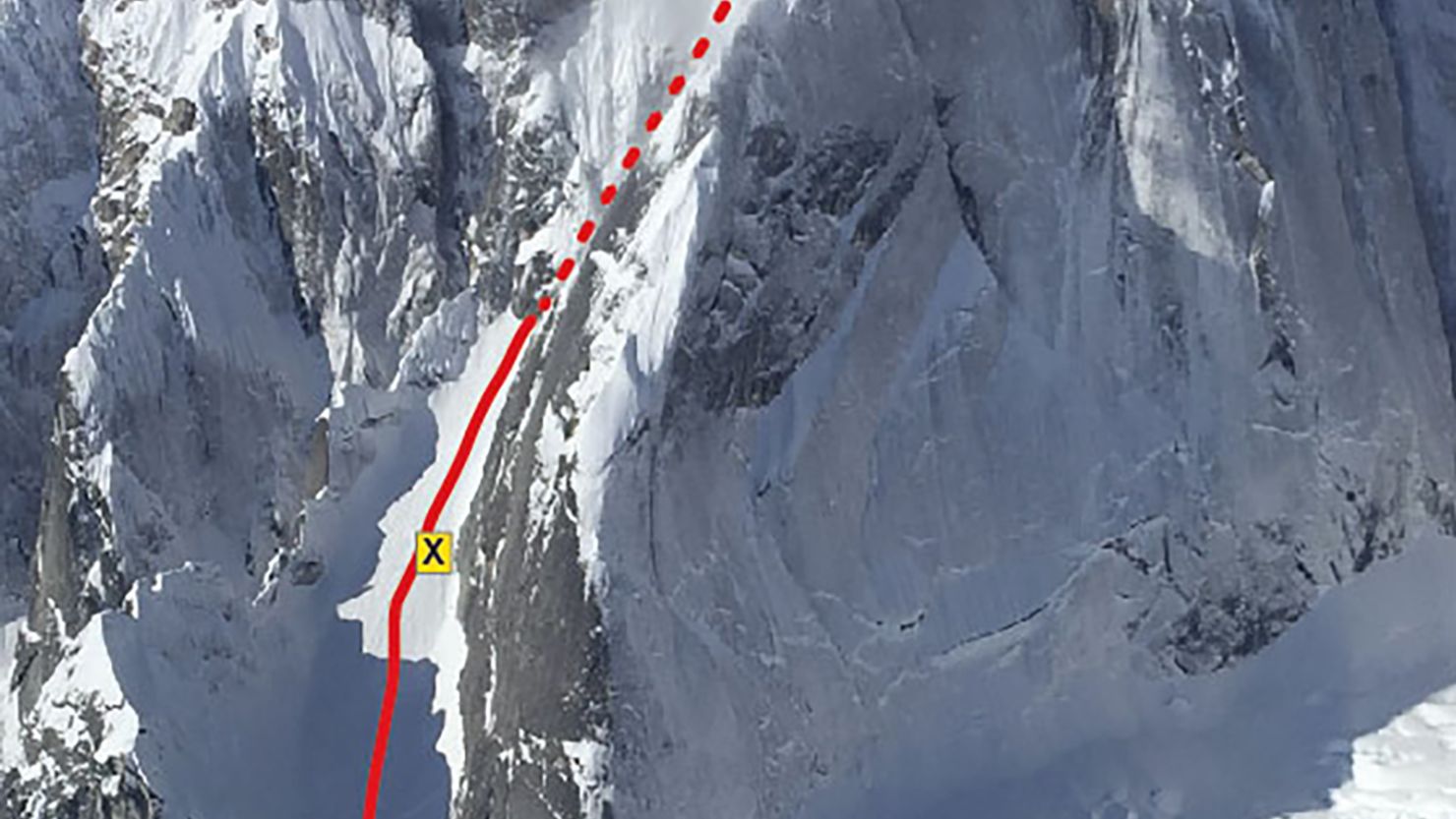 This handout photo shows the "Escalator" route on Mt. Johnson, Denali National Park and Preserve. The X indicates the approximate location of the rescue of the surviving climbing.