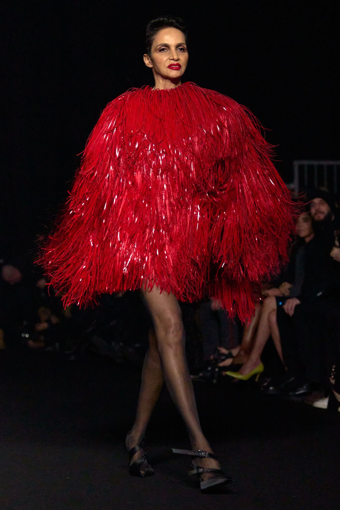 Former model and French documentary filmmaker Farida Khelfa was spotted walking for Mugler.