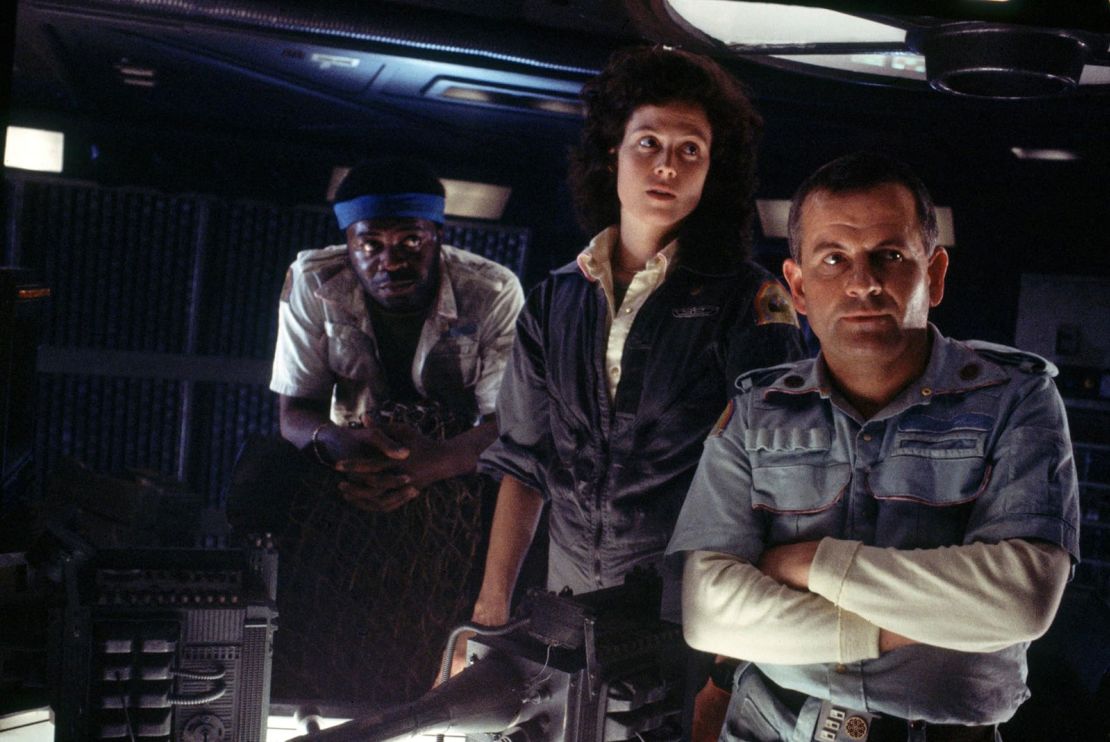 A still from the movie Alien, showing actors Yaphet Kotto, Sigourney Weaver and Ian Holm. 