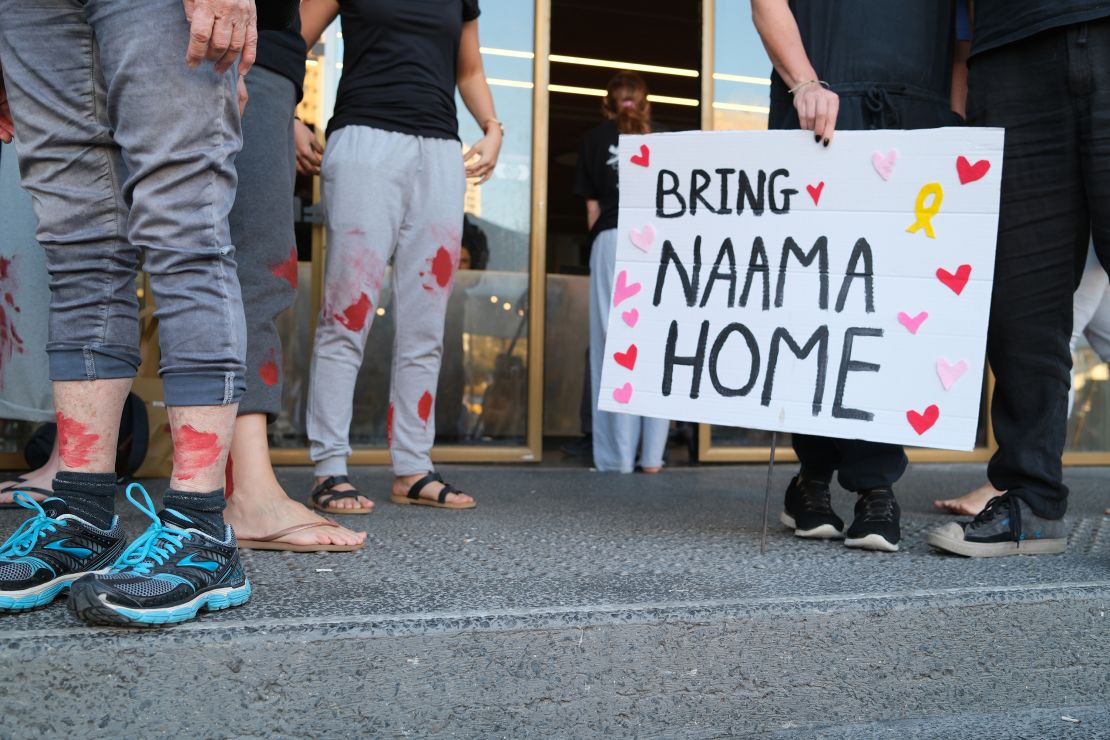 Women dressed as Naama Levy gather at Hostages Square in Tel Aviv on Saturday, October 19.