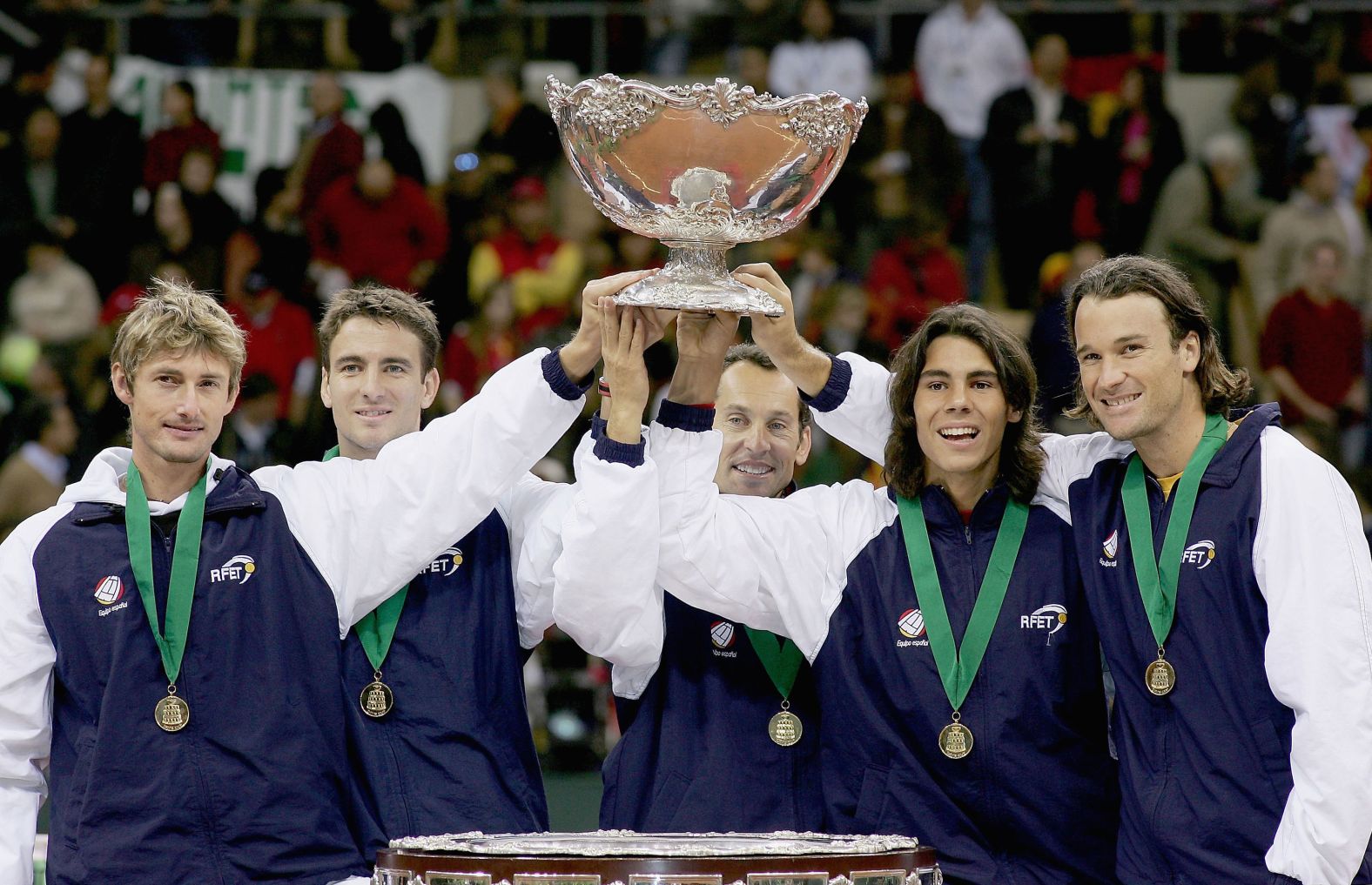 Nadal, second from right, poses with other members of Team Spain after they won the Davis Cup in December 2004. With Nadal, from left, are Juan Carlos Ferrero, Tommy Robredo, Jordi Arrese and Carlos Moya.