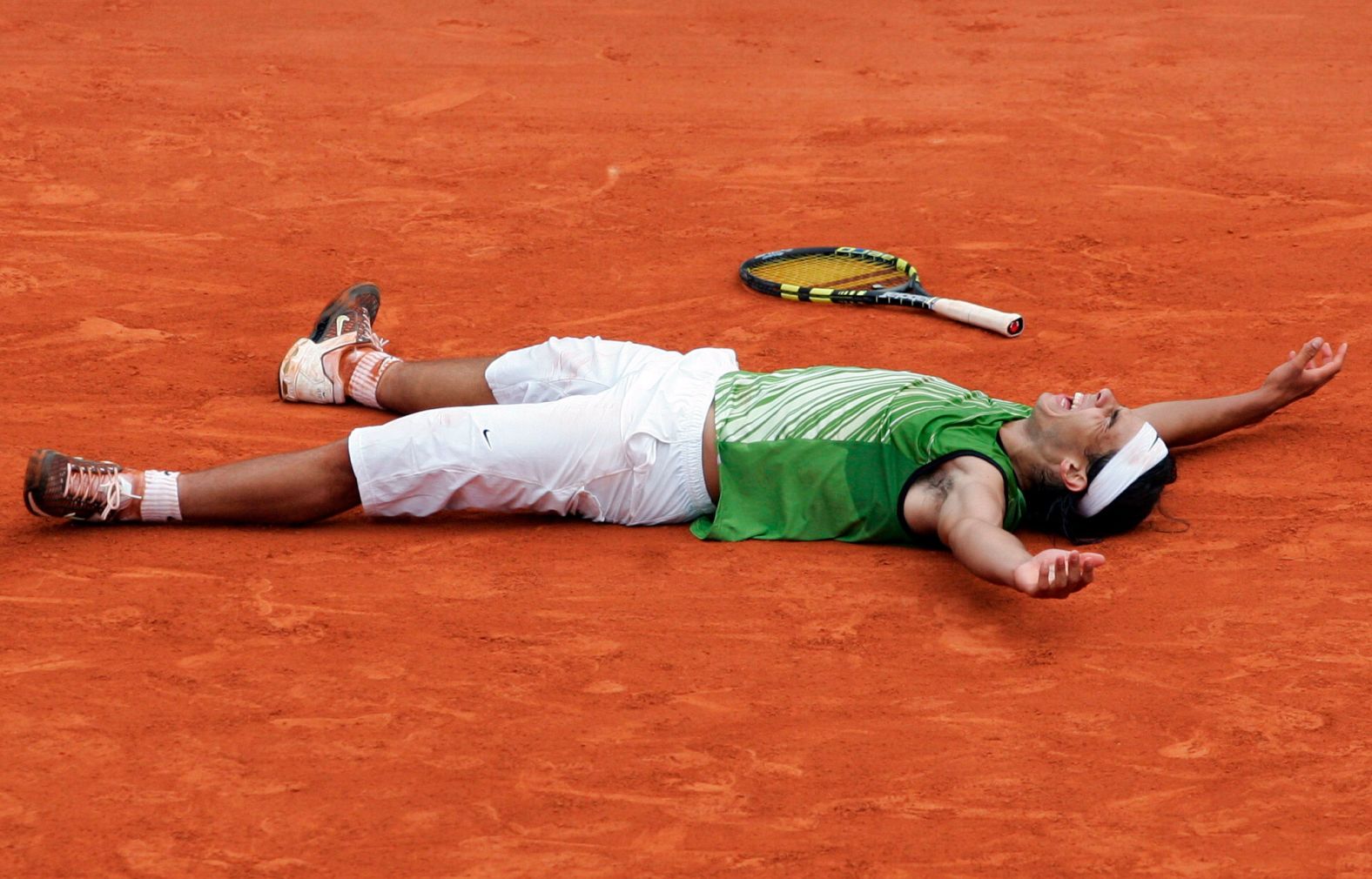 Nadal reacts after he won the French Open final in June 2005. He defeated Mariano Puerta to claim his first grand slam title.