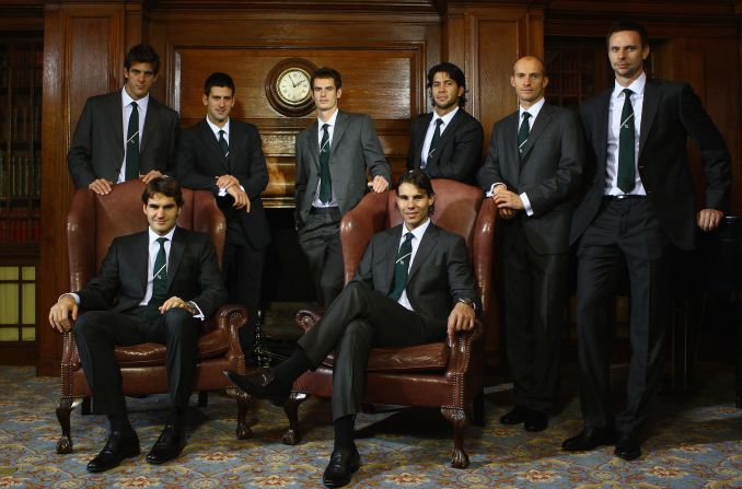 Nadal and Federer are seated for a group photo with other stars at the ATP World Tour Finals in November 2009. Standing, from left, are Juan Martin del Potro, Djokovic, Andy Murray, Fernando Verdasco, Nikolay Davydenko and Robin Soderling.