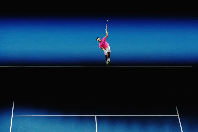 Nadal delivers a serve during an Australian Open match in 2015.