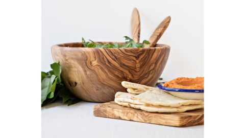 Salad bowl in natural olive wood with cutlery