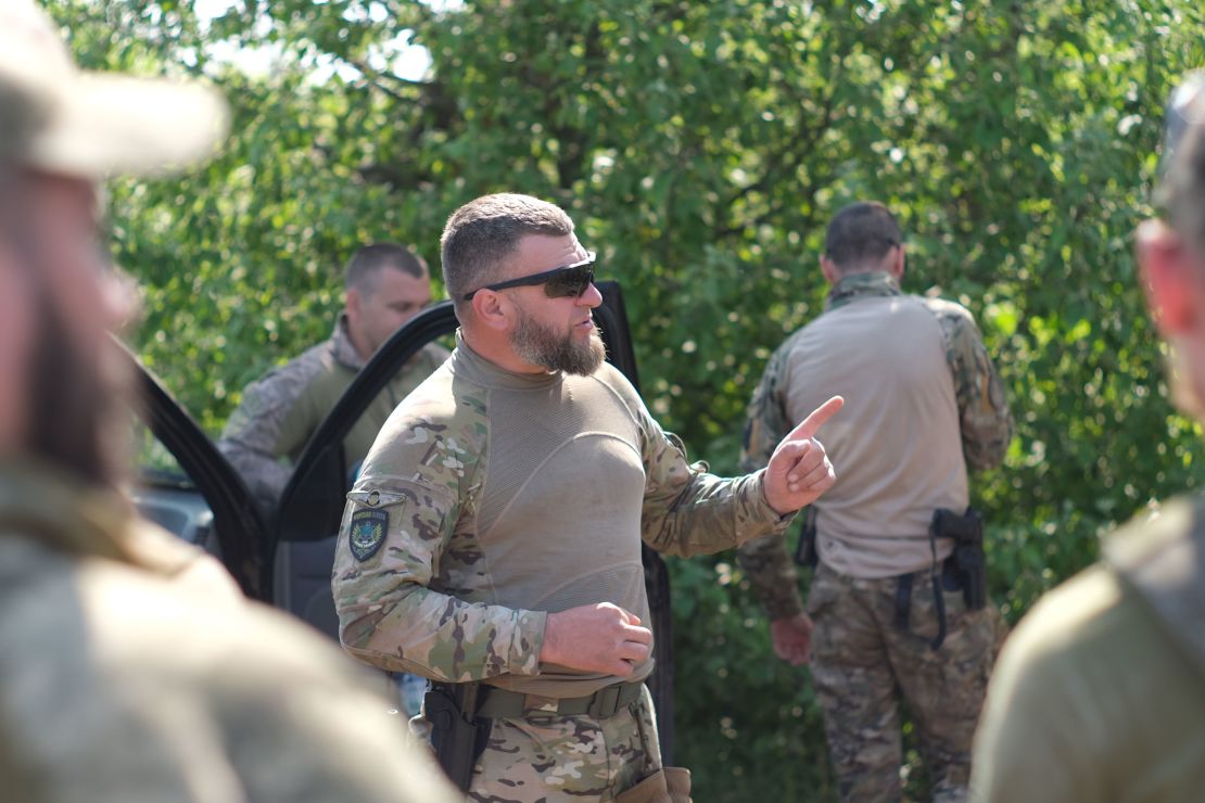 Oleksandr is pictured in 2013 during Ukraine's counteroffensive near Urozhaine.