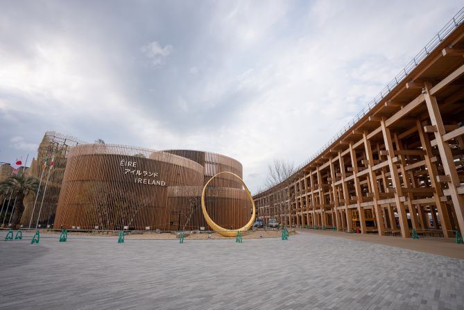 The <a href="https://www.expovisitors.expo2025.or.jp/pavilions/601dfe25-9a69-40e5-9b6f-8657320006f7" target="_blank">Ireland Pavilion</a> is modeled after a “<a href="https://irishcultureandtraditions.org/2024/02/18/the-triskele-symbol-explained-origins-meanings-and-modern-significance/" target="_blank">triskele</a>,” an ancient Celtic motif composed of three conjoined spirals. Clad in <a href="https://www.ireland.ie/en/expo/ireland-pavilion/" target="_blank">Irish timber</a>, the pavilion echoes Japan’s history of wooden craftsmanship and the Grand Ring that runs around the entire Expo site.