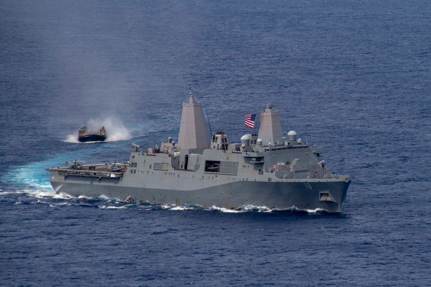 Amphibious transport dock USS New Orleans sails alongside a Japan Maritime Self Defense Force landing craft on June 13, 2021. (MC3 Jomark Almazan/Navy)