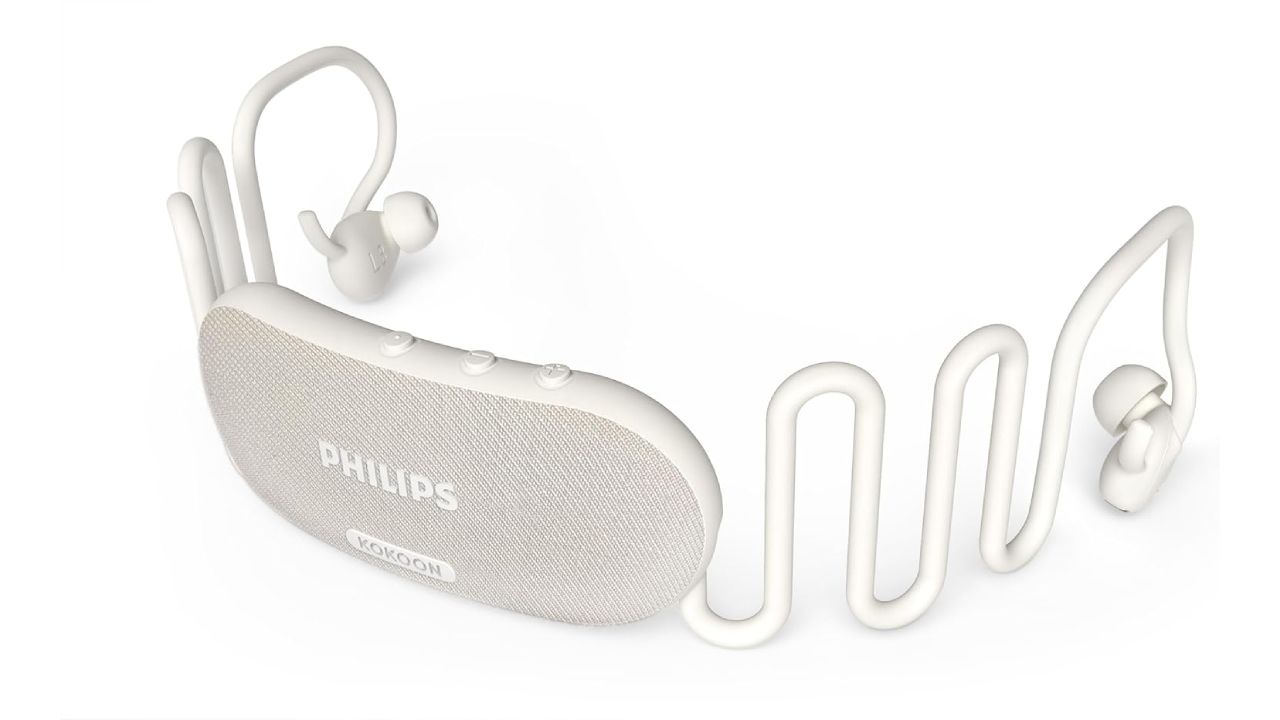 Woman wearing sleep headset comfortably in bed