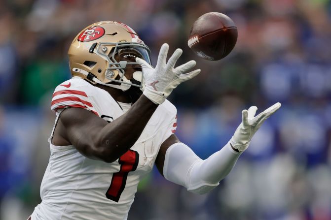 San Francisco 49ers wide receiver Deebo Samuel makes a catch during his team's <a href="https://www.cnn.com/2024/10/11/sport/san-francisco-49ers-seattle-seahawks-tnf-nfl-spt-int/index.html">36-24 victory</a> over the Seattle Seahawks in Seattle on Thursday, October 10. Samuel <a href="https://www.nfl.com/news/niners-deebo-samuel-becomes-first-wr-in-20-20-touchdown-club" target="_blank">became the first wide receiver in NFL history</a> with 20 touchdown receptions and 20 touchdown runs after scoring on a 76-yard touchdown catch.