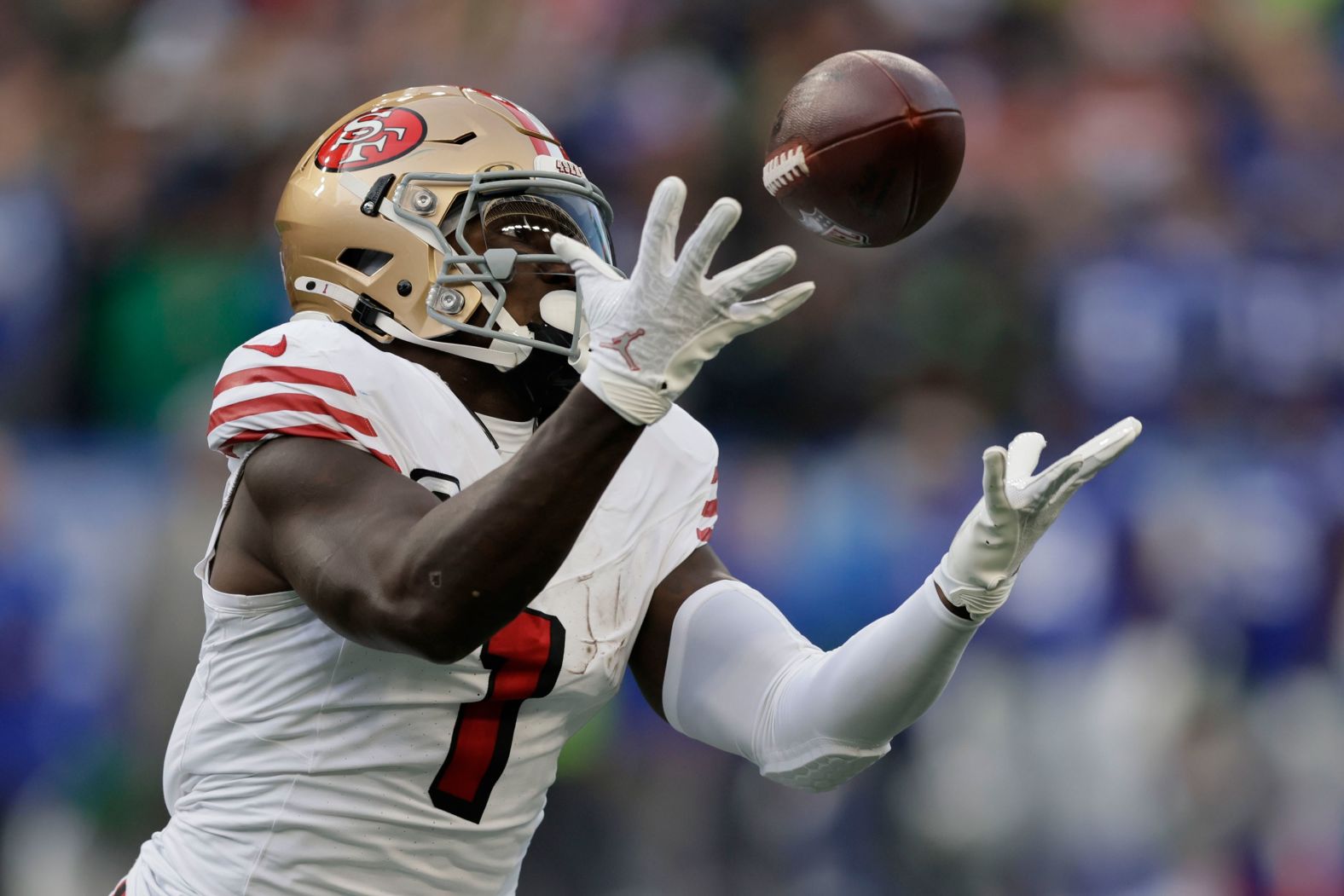 San Francisco 49ers wide receiver Deebo Samuel makes a catch during his team's <a href="index.php?page=&url=https%3A%2F%2Fwww.cnn.com%2F2024%2F10%2F11%2Fsport%2Fsan-francisco-49ers-seattle-seahawks-tnf-nfl-spt-int%2Findex.html">36-24 victory</a> over the Seattle Seahawks in Seattle on Thursday, October 10. Samuel <a href="index.php?page=&url=https%3A%2F%2Fwww.nfl.com%2Fnews%2Fniners-deebo-samuel-becomes-first-wr-in-20-20-touchdown-club" target="_blank">became the first wide receiver in NFL history</a> with 20 touchdown receptions and 20 touchdown runs after scoring on a 76-yard touchdown catch.