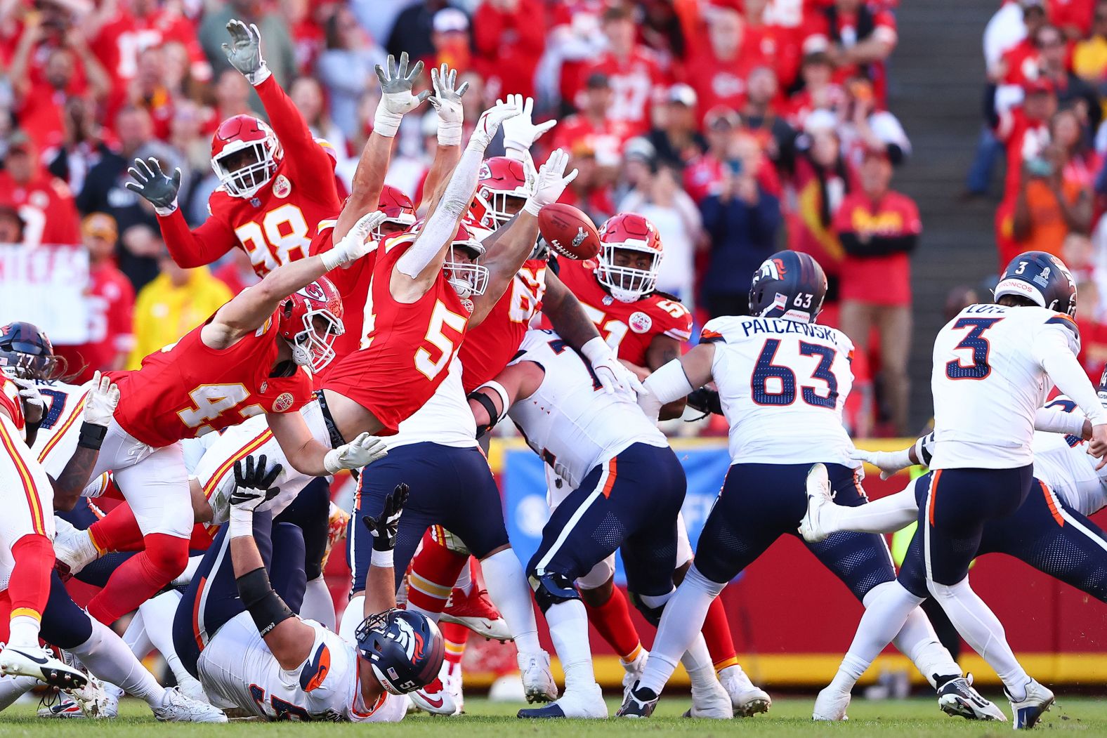 Kansas City Chiefs linebacker Leo Chenal (54) <a href="index.php?page=&url=https%3A%2F%2Fwww.cnn.com%2F2024%2F11%2F10%2Fsport%2Fchiefs-block-field-goal-to-defeat-broncos-spt-intl%2Findex.html">blocks a 35-yard field goal attemp</a>t from Denver Broncos kicker Wil Lutz in the last play of the game in Kansas City, Missouri, on Sunday, November 10. The Chiefs won 16-14 and remain undefeated this season.