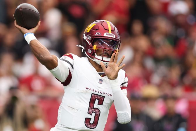 Washington Commanders quarterback Jayden Daniels passes in the first half of the team's 42-14 win over the Arizona Cardinals in Glendale, Arizona, on Sunday, September 29.