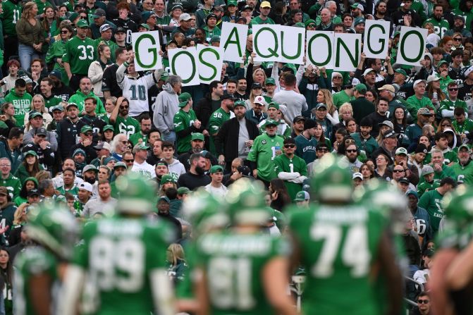 Philadelphia Eagles fans hold a sign that reads 